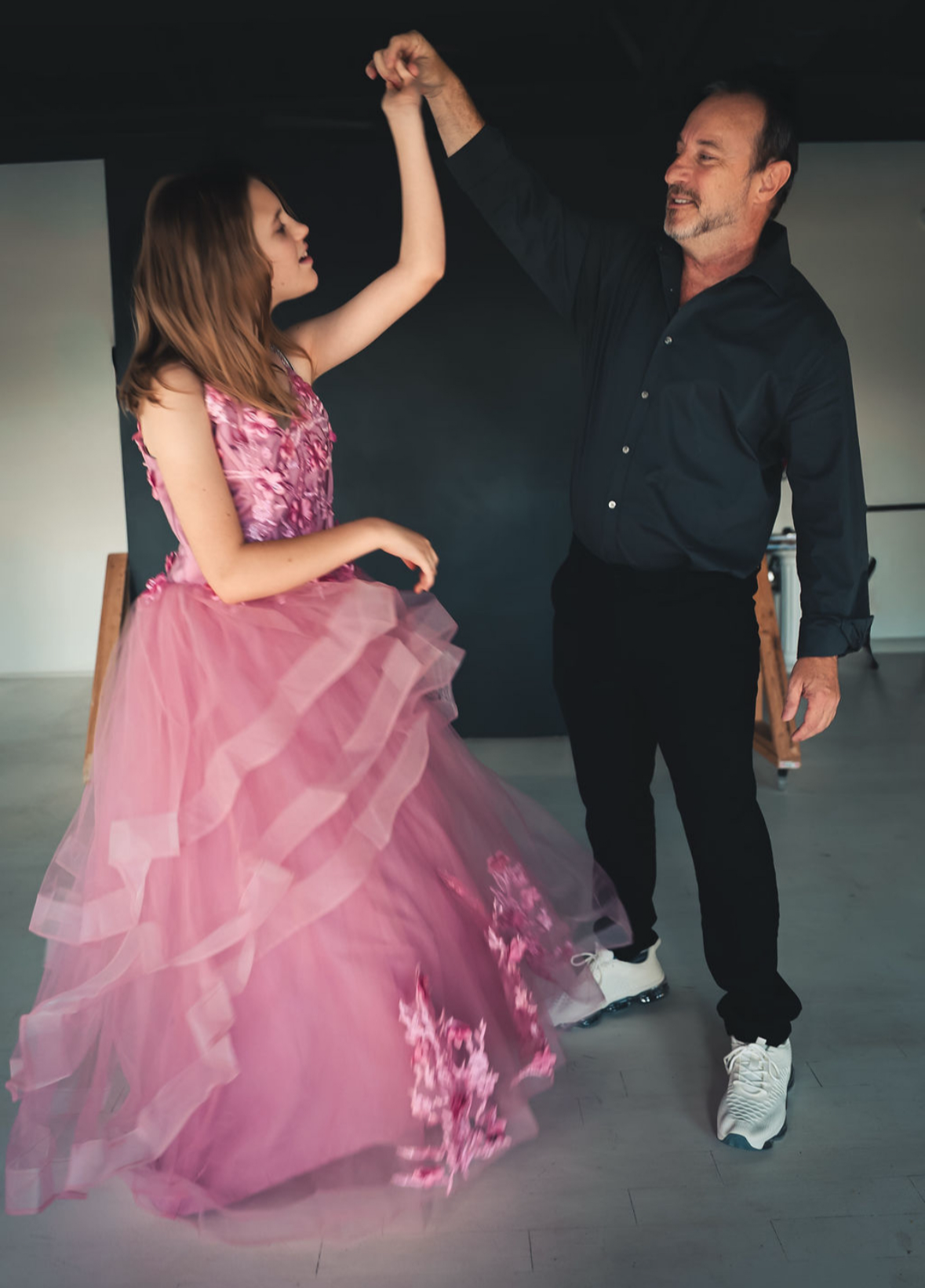 Jim Fuller dancing with his daughter